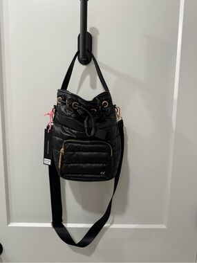Black Quilted Drawstring Shoulder Bag with Front Zip Pocket